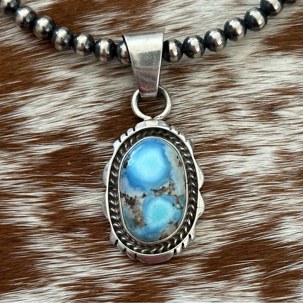 Golden hills turquoise Navajo sterling silver pendant